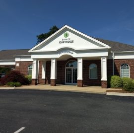 Image of the Bank of Oak Ridge building entrance in Summerfield.