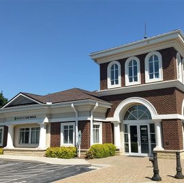 Image of the Bank of Oak Ridge building entrance in Greensboro at Lake Jeanette.