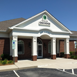 Image of the Bank of Oak Ridge building entrance in Greensboro at New Garden.