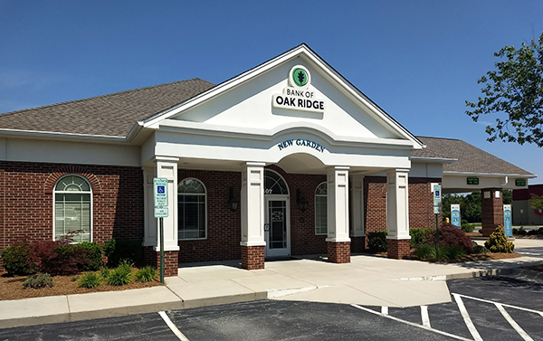 Image of the Bank of Oak Ridge building entrance in Greensboro at New Garden.